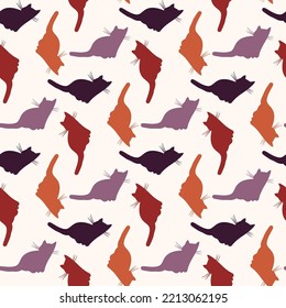 Seamless pattern - funny cartoon kittens. Vector illustration.