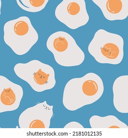 Seamless pattern with funny cat and fried eggs on blue background. Hand draw cute cats in doodle style. For textiles, clothing, bed linen, office supplies.