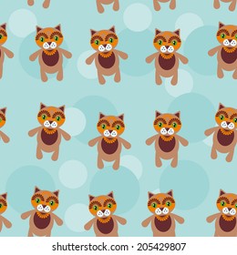 Seamless pattern with funny cute cat animal on a blue background. Vector
