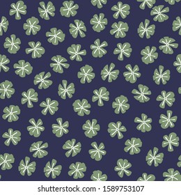 Seamless pattern with funny green abstract flowers on a blue background. Vector illustration.