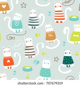 Seamless pattern with funny kittens in cartoon style. Smiling and playing Cats