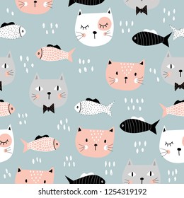 Seamless pattern with funny kittens and fish. Children's illustration. For printing on children's clothes. Hand-drawn.