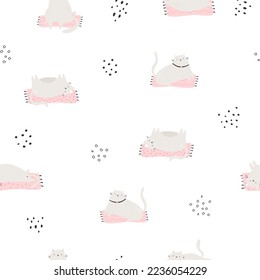 Seamless pattern with funny lazy cats lying on carpets. Cute design for fabric prints, wrapping paper, clothing