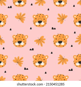 Seamless pattern with funny leopard faces on a pink background. Childish vector doodle illustration for wrapping paper, kids textile design.