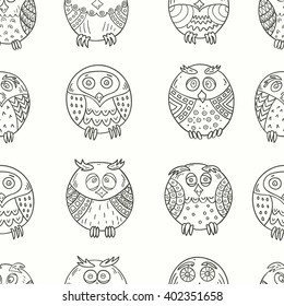 Seamless pattern of funny owls hand-drawn. Monochrome gamma . Vector graphics.