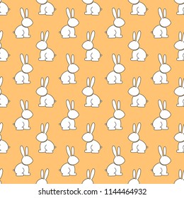 Seamless pattern of funny rabbit, hare. Vector of a cartoon cheerful hare seamless pattern. Hand drawn children's pattern from the bunny, rabbit.