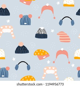 Seamless pattern with funny winter hats. Fashion Christmas print. Vector hand drawn illustration.