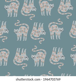 Seamless pattern of funny wool cats in the form of flowers. Vector illustration isolated on white background. 