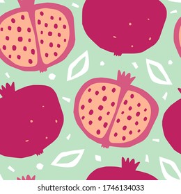 Seamless pattern with garnets. Doodle fruits. Modern textile, greeting card, poster, wrapping paper designs. Hand-drawn illustration.