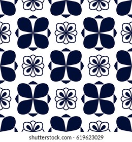 Seamless pattern with geometric blue ornament on white background. Abstract flowers and petals.