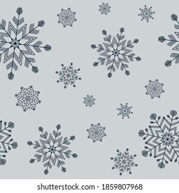 Seamless pattern of geometric dark snowflakes different sizes on grey background. Flat style winter holiday and Happy New Year concept. Christmas ornament for textile wallpaper or wrapping paper