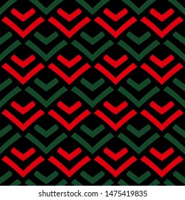 Seamless pattern with geometric elements on a dark background.