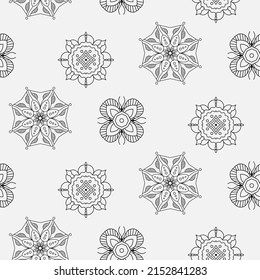 Patrón inmaculado con ornamentos geométricos y florales sobre el fondo blanco. Patrón vintage al estilo indio. Ilustración vectorial ideal para textil, envoltura, papel decorativo, raspado.