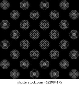 Seamless pattern from geometric shapes in black and white colors