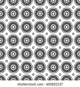 Seamless pattern with geometric shapes and symbols. Figures from specks, circles on a light background.Vector texture or background pattern.