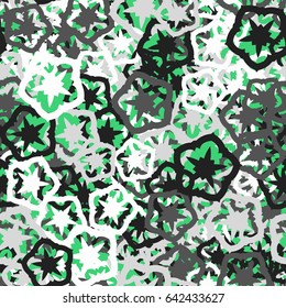 Seamless pattern. Geometrical flowers. The five-sided elements. Fashionable camo for women and children. Green, white, gray tones.