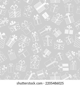 Seamless pattern of gift boxes with bows and different patterns, white on gray background