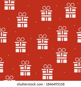 Seamless pattern of gift boxes in flat style on a red background.