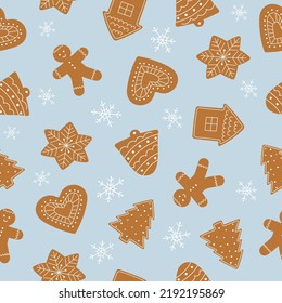 Seamless pattern of gingerbread cookies. Winter homemade sweets on blue background. Vector illustration