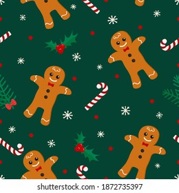 Seamless pattern gingerbread man, candy, snowflake and christmas element on  
emerald background.
Celebratory pattern for decorating gifts, fabrics and clothes for the New Year and Christmas.