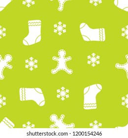 Seamless pattern with gingerbread man, christmas socks, snowflakes. Christmas and New Year 2019 background. Design for packaging paper, fabric and other print. 
