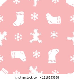 Seamless pattern with gingerbread man, christmas socks, snowflakes. Christmas and New Year 2019 background. Design for packaging paper, fabric and other print. 
