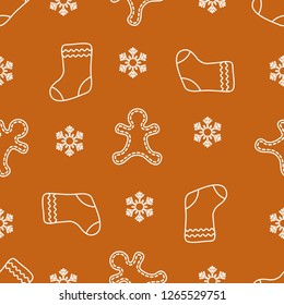 Seamless pattern with gingerbread man, christmas socks, snowflakes. Christmas and New Year 2019 background. Design for packaging paper, fabric and other print. 