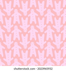 Seamless pattern with gingerbread man. Decorative background. Pink texture design.