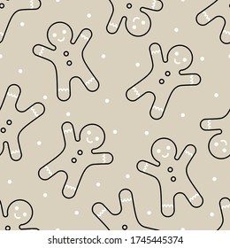 Seamless pattern of gingerbread mans and white circles on beige background