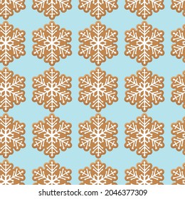 Seamless pattern with Gingerbread snowflake cookie on blue. Traditional Christmas bakingg. Winter Holiday symbol. Tasty cookie. Seasonal repeated background for textile, wrapping paper, wallpaper