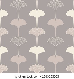 Seamless pattern of ginkgo leaves in shades of beige.