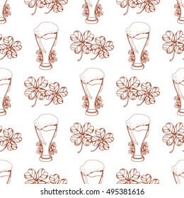 Seamless pattern with a glass of foamy beer and clover.