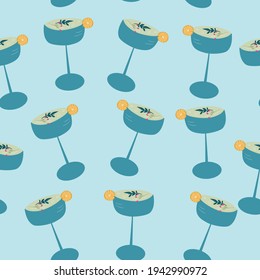 Seamless pattern from glasses of Cocktails. Vector illustration on a light blue background. 