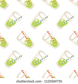 Seamless pattern with glasses of sweet green soda water. Hand drawn vector illustration.