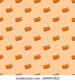 Seamless pattern with glazed pastry bun with hazelnut sprinkles. Fresh bakery print for breakfast or snack for tea and coffee. Easter cake for spring holiday. Vector flat illustration