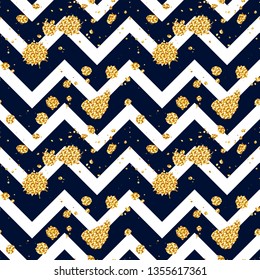 Seamless pattern with glittering splashes and stains on chevron background. Vector illustration.