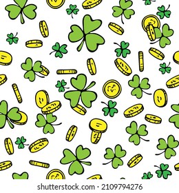 Seamless pattern with gold coins and green lucky shamrock or clover leaves for St. Patrick`s Day