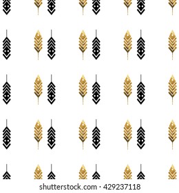 Seamless pattern with gold feathers. Tribal feathers on white background. Feathers Aztec seamless pattern. 