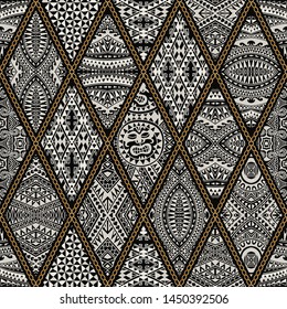 Seamless pattern with golden chains, rings, patchwork from beige ornate rhombus with Maori tattoo ornaments on a black background. Batik fashion collection, wallpaper, textile monochrome print