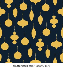 Seamless pattern of golden Christmas decoration on dark blue background. Christmas tree decoration in different shapes. Vector illustration