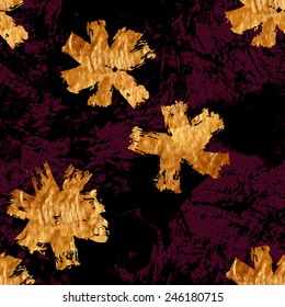 Seamless pattern with golden flowers and ink blots Sloppy strokes of a acrylic paint. 