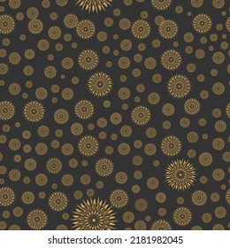 Seamless pattern of golden flowers on a black background.