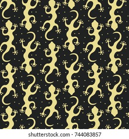 Seamless pattern with golden lizards on the black background. Vector illustration.