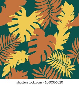 Seamless pattern of Golden and orange palm leaves, banana and monstera on an emerald background .Cute vector background with tropical leaves. Vector illustration in flat style