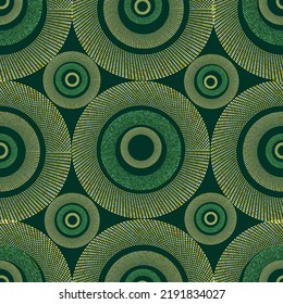 Seamless pattern with golden  rings. Glittering pieces. fabric texture.