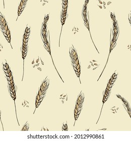 
Seamless pattern with golden wheat on beige background
