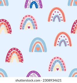 Nahtlose Muster anmutige Regenbögen in Boho-Farben. Skandinavischer Babyhandstil für Neugeborene