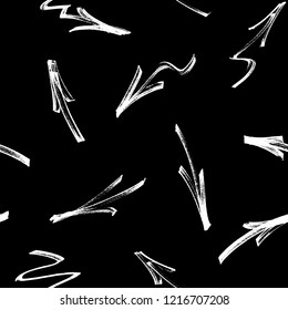 Seamless pattern of graffiti arrows drawn by a white marker on black background. Vector illustration EPS 10