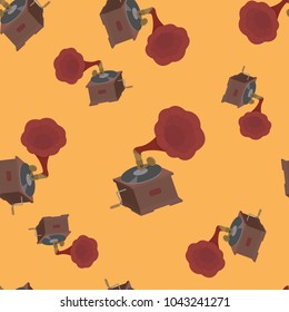 Seamless pattern with gramophones on an orange background. For decorating textiles and packaging. Vector illustration.