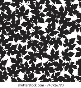 Seamless Pattern with grape leaves. Abstract silhouette of maples leaves texture.
